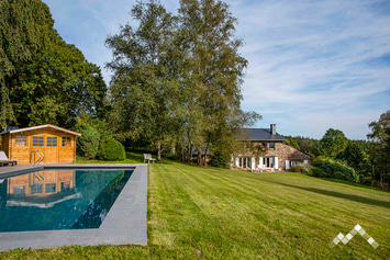 Maison ardennaise à Stoumont pour 9 personnes avec piscine, pétanque et vue panoramique.